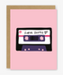 Greeting card with a cassette tape design and 'Love Songs' text on a pink background
