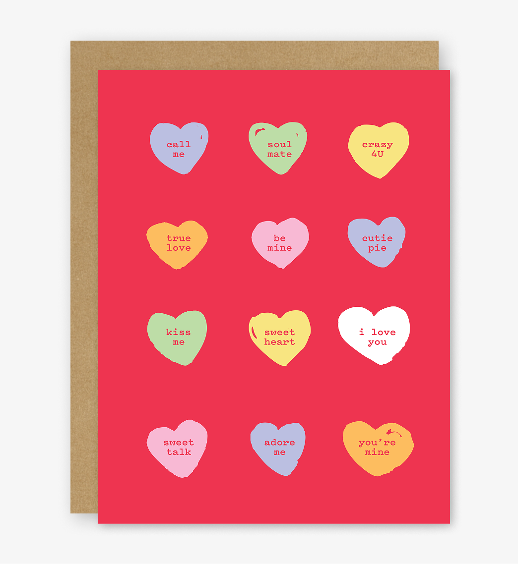 Greeting card with colorful heart-shaped candy text on a red background