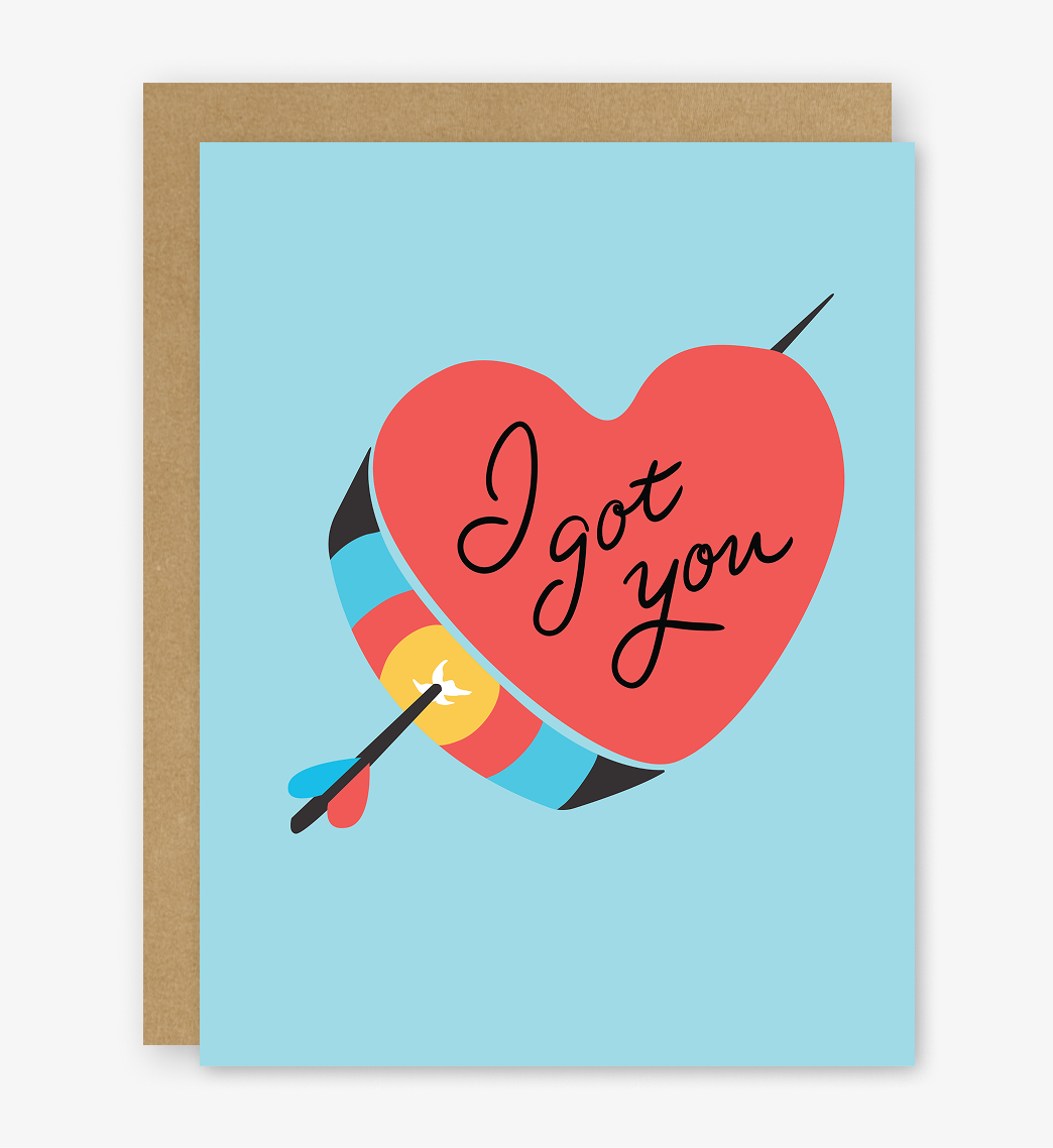 Greeting card with a red heart and colorful arrow on a blue background