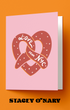 Greeting card with pretzel design and 'Love from NYC' text on a pink background, with 'Stacey O'Nary' branding.