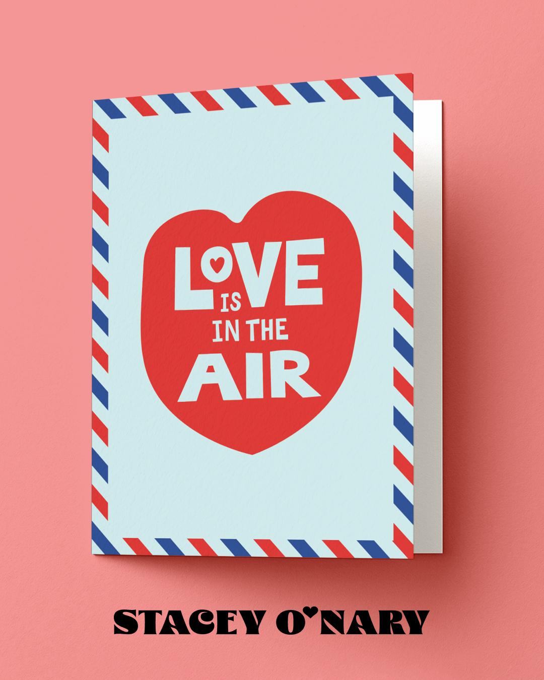 Greeting card with 'Love is in the Air' design on a pink background